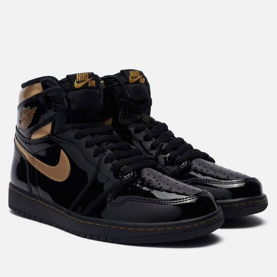 gold and black air jordan 1