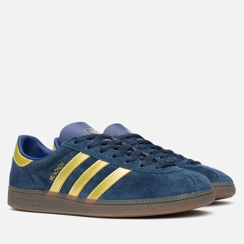 navy and gold adidas trainers